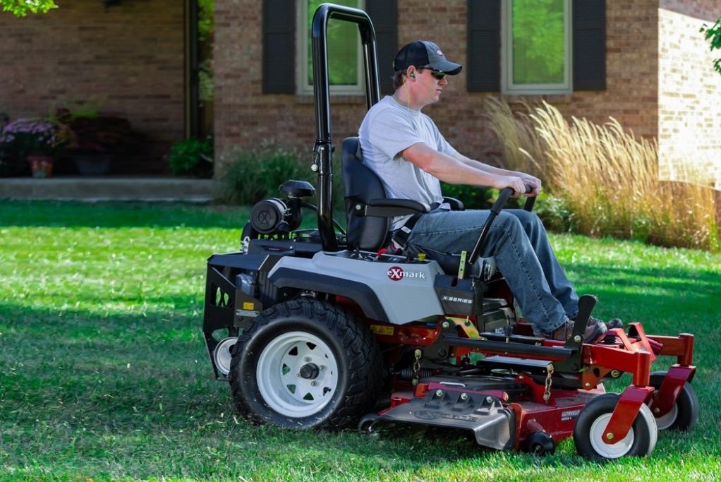 Exmark dealer in PA driving riding lawn mower